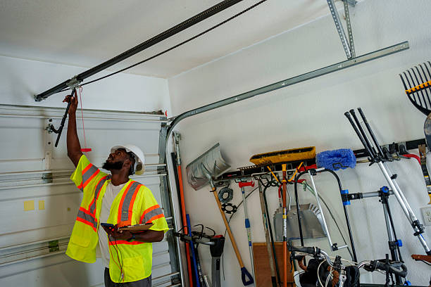 Professional Garage Door Panel Replacement technician working in Baltimore city County, MD